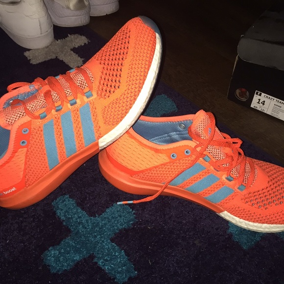 bright orange adidas trainers